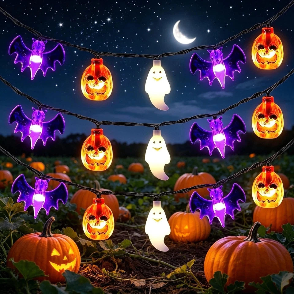 Orange pumpkin, purple bat, and white ghost string lights with remote
