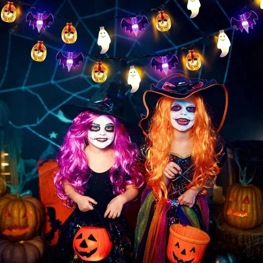 Halloween string lights above a costume party display
